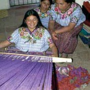 Cojolya weavers María Tiney, María Sosof and Concepción Queju demonstrate the backstrap loom weaving process.