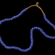 Different areas of Guatemala adopted different colors of beads. The most striking example is the town of Patzún, where the indigenous prized and still wear blue beads.