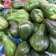 A few of the several varieties of güisquil; used in many of the same ways that the potato is, though it is more tender and has a slightly nutty flavor.