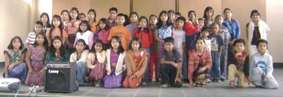 45 children receive their scholarship onstage
