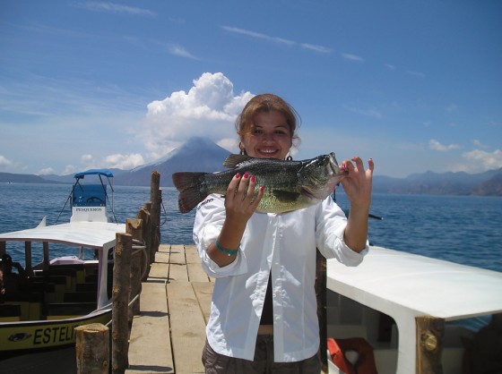 Karla S. is among the many anglers who frequent the Panajachel piers for bass.  (photo: Brennan Harmuth)